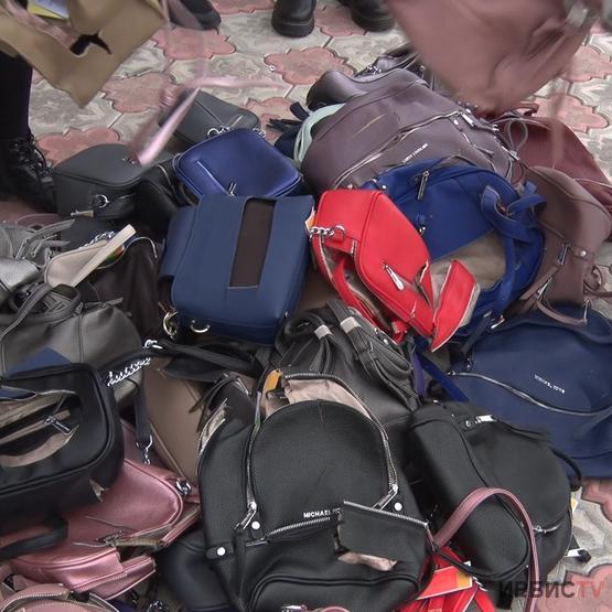 Почти 60 контрафактных сумок уничтожили сотрудники департамента юстиции в Павлодаре